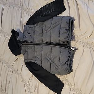Boys large / 7 gray and black Jordan thermal fit vest jacket.